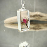 Acorn necklace with real rose bud on leather cord