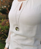 Acorn necklace with real moss, on leather cord
