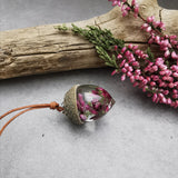 Acorn necklace with real pink heather on leather cord