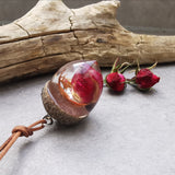 Acorn necklace with real rose bud on leather cord